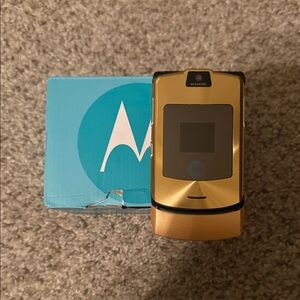 Authentic Dolce and Gabana Motorola razor phone Classic Gold Flip Phone